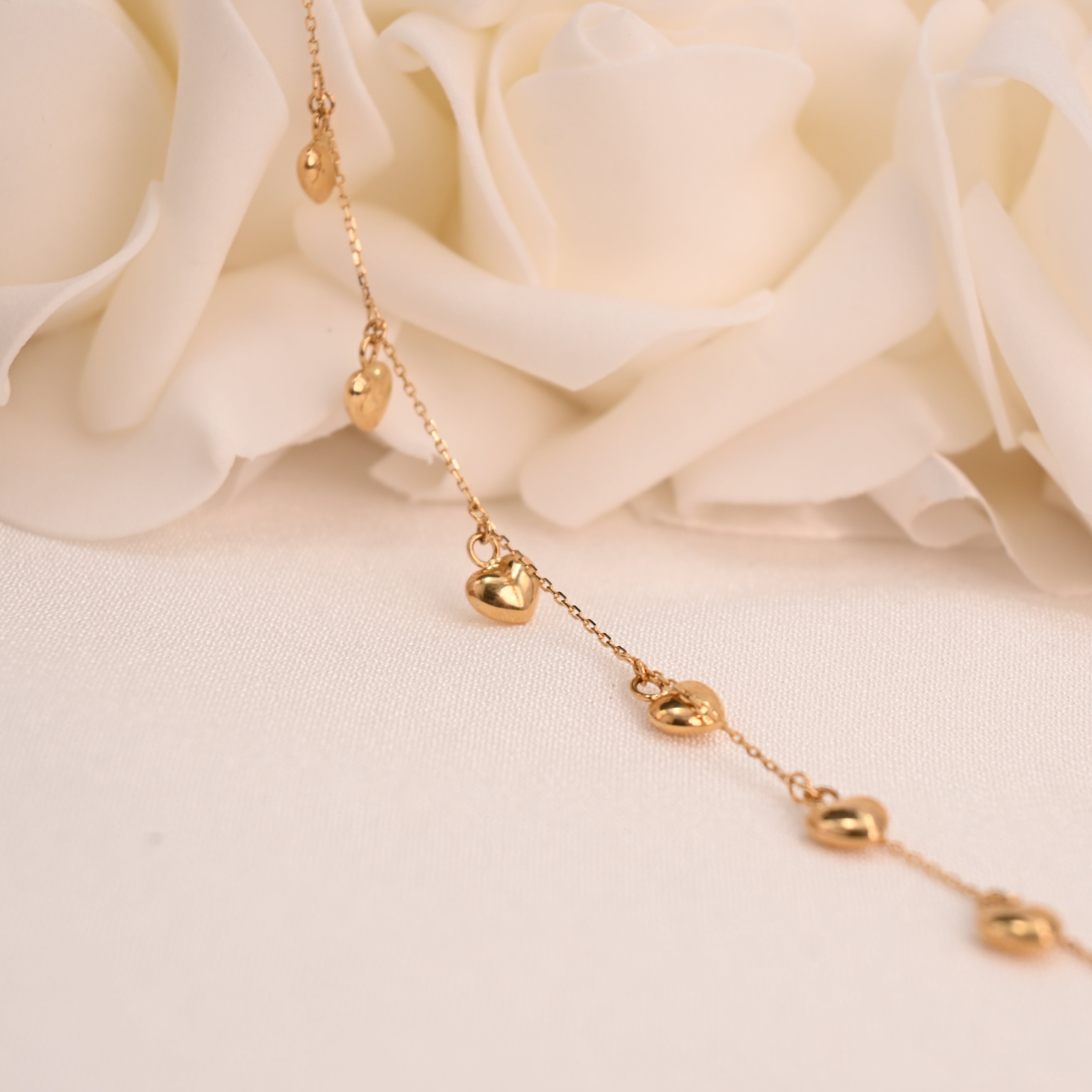 14k Dainty Hanging Hearts Bracelet