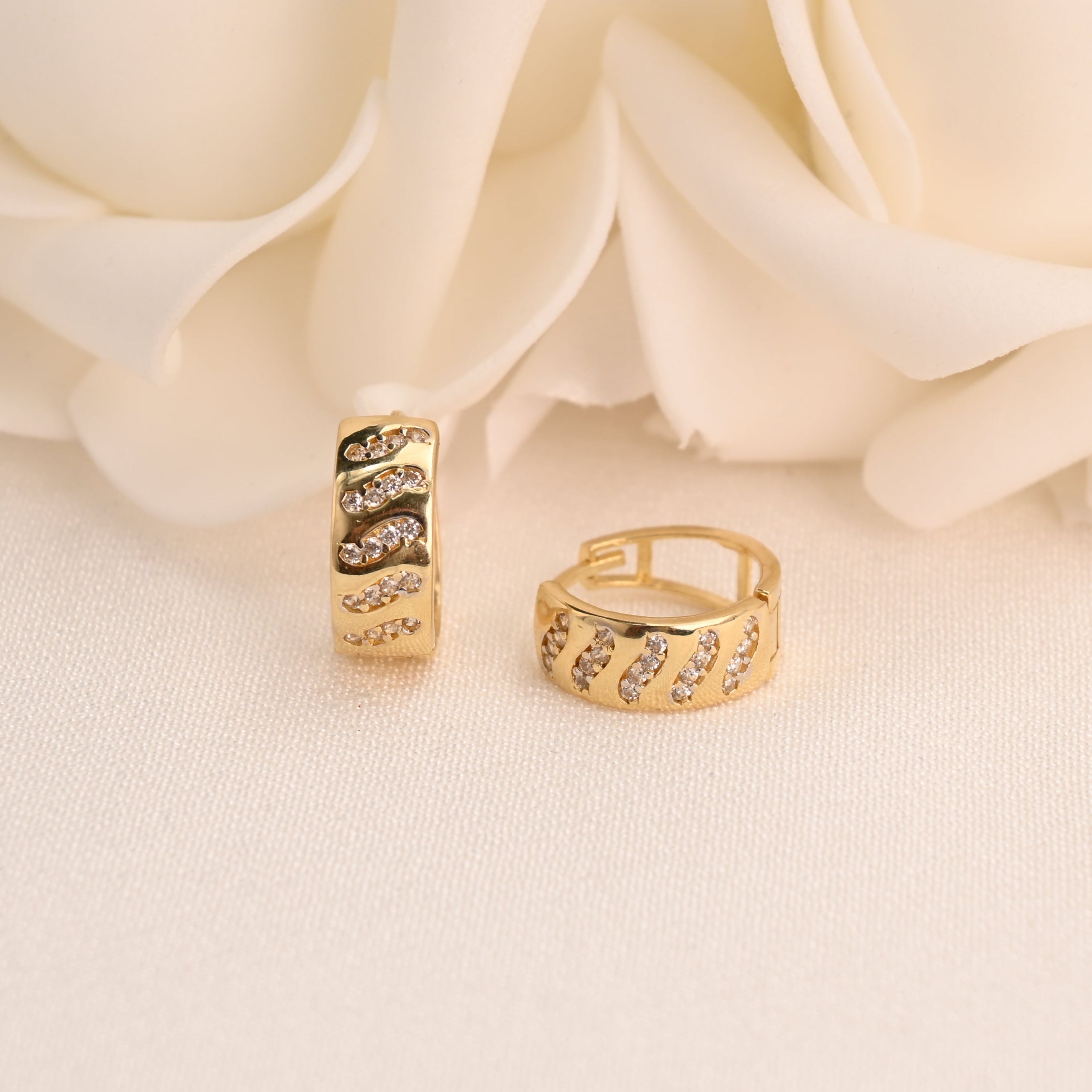 14k Wavy CZ Huggie Earrings