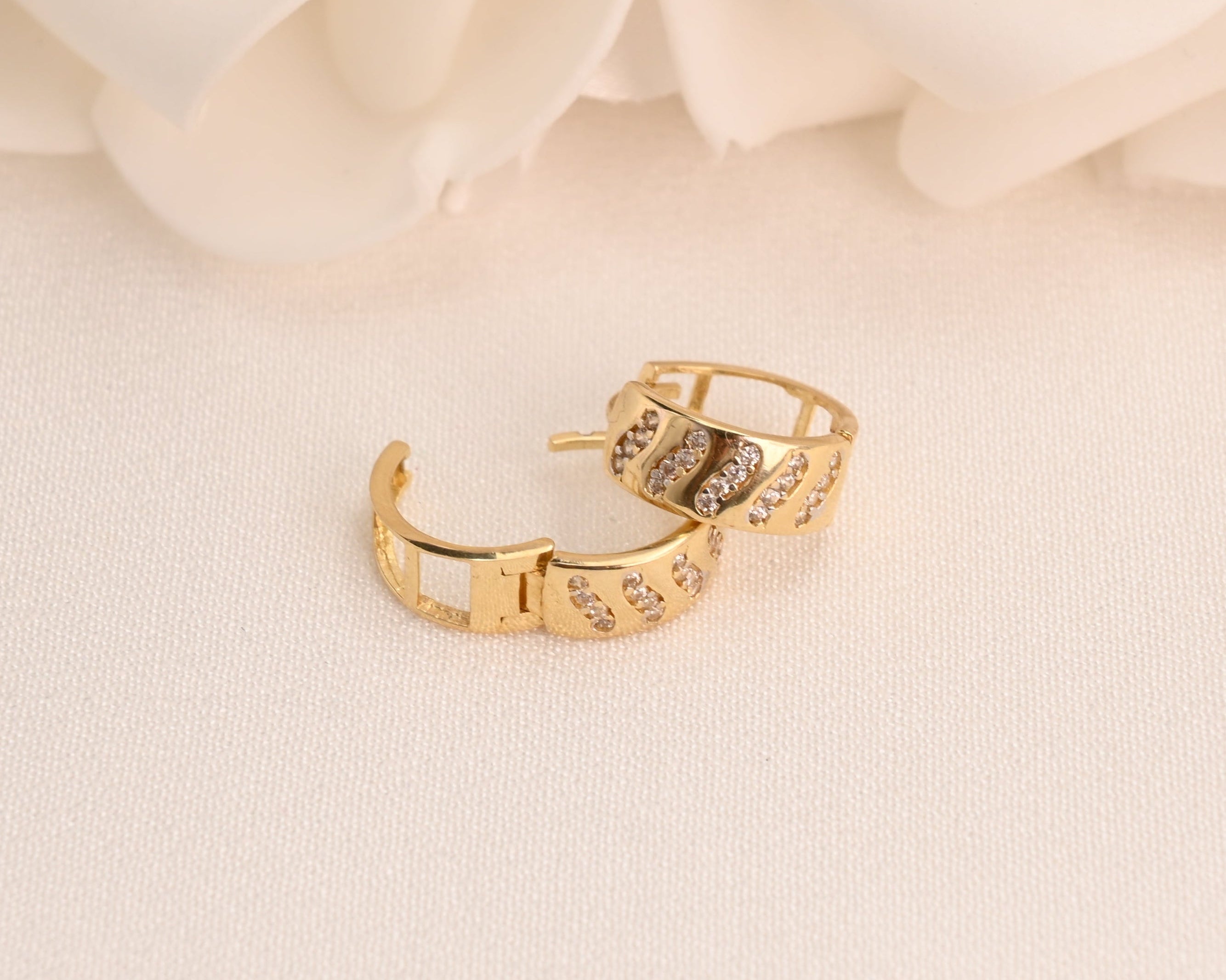 14k Wavy CZ Huggie Earrings