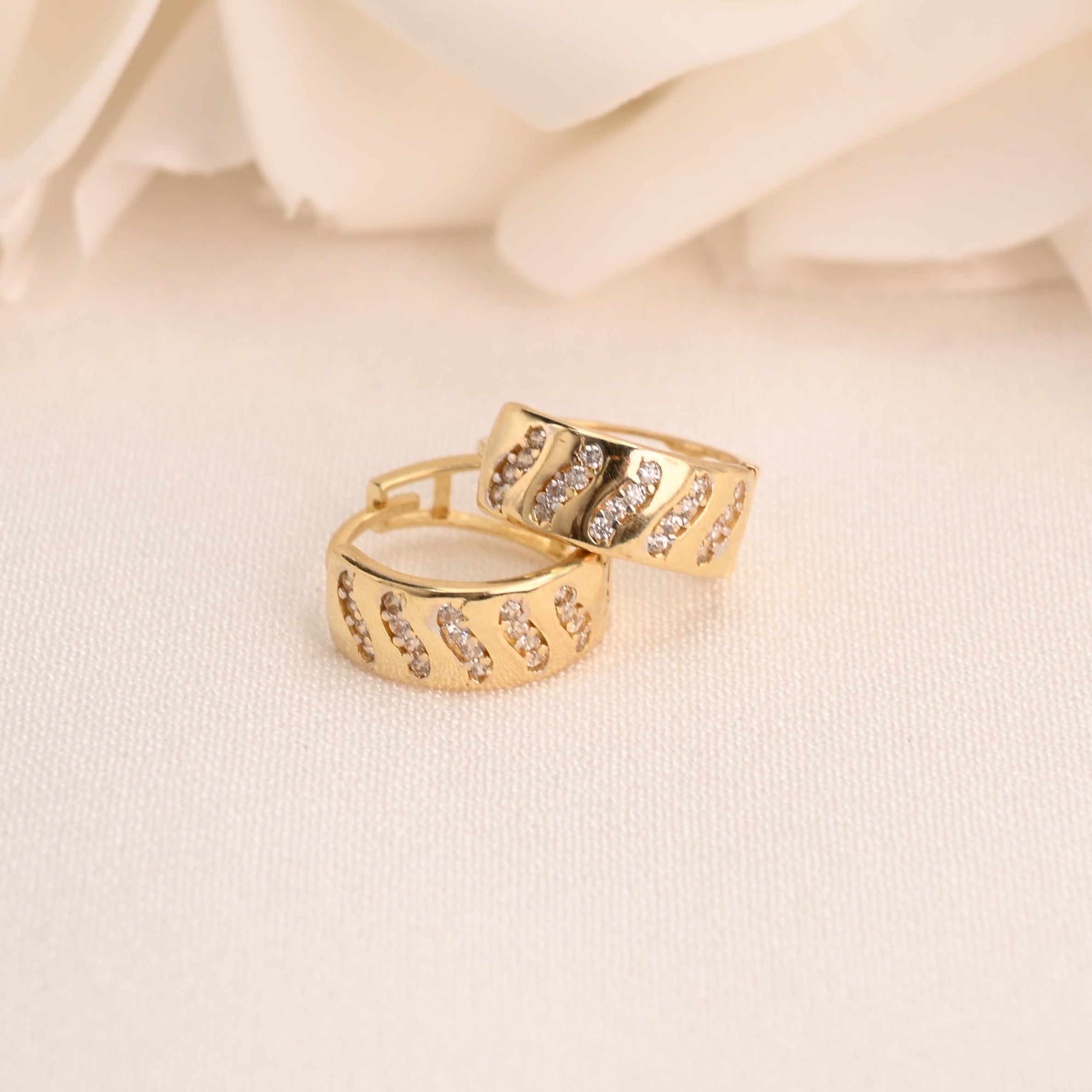 14k Wavy CZ Huggie Earrings