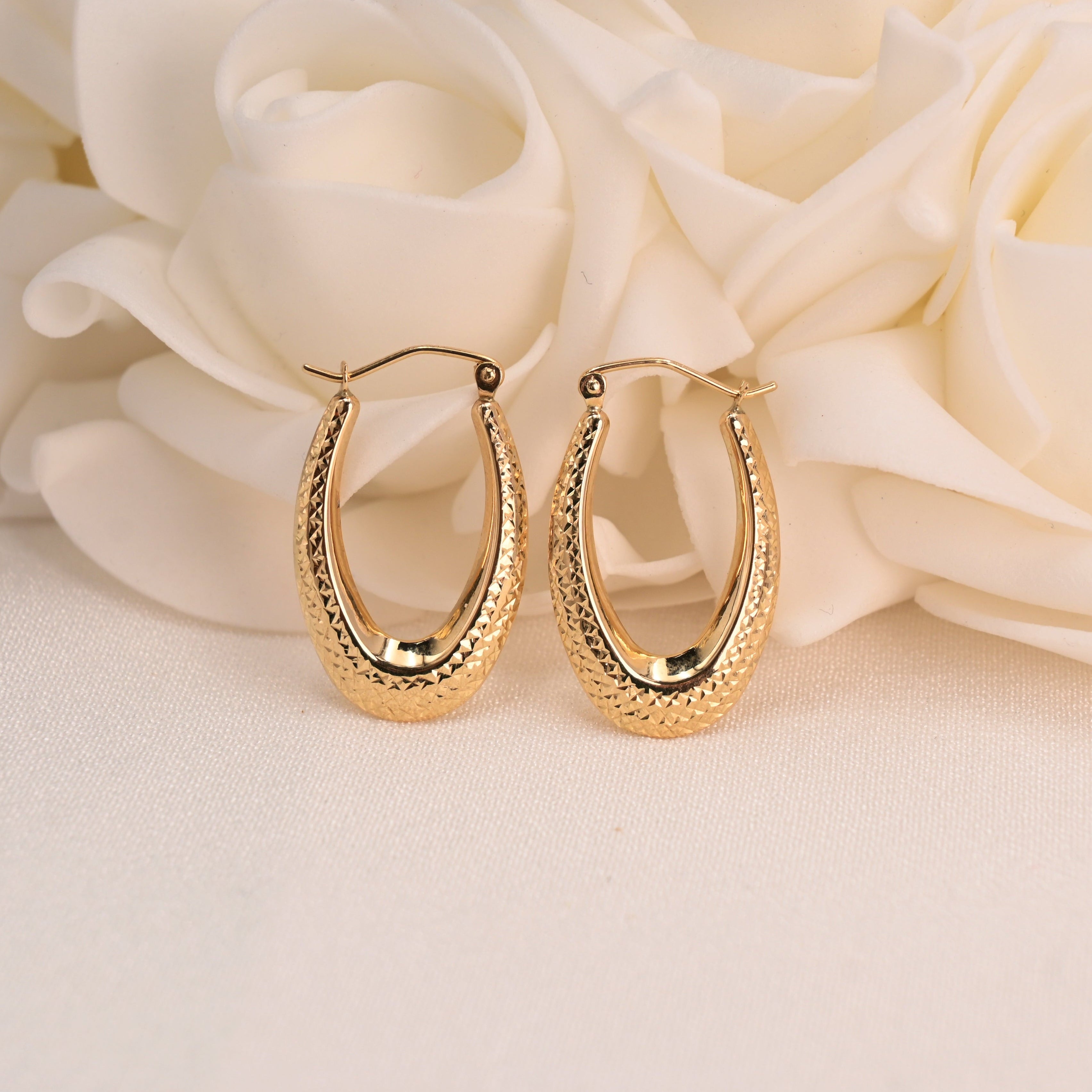 Beautiful 14k Gold Diamond Cut Oval Hoop Earrings