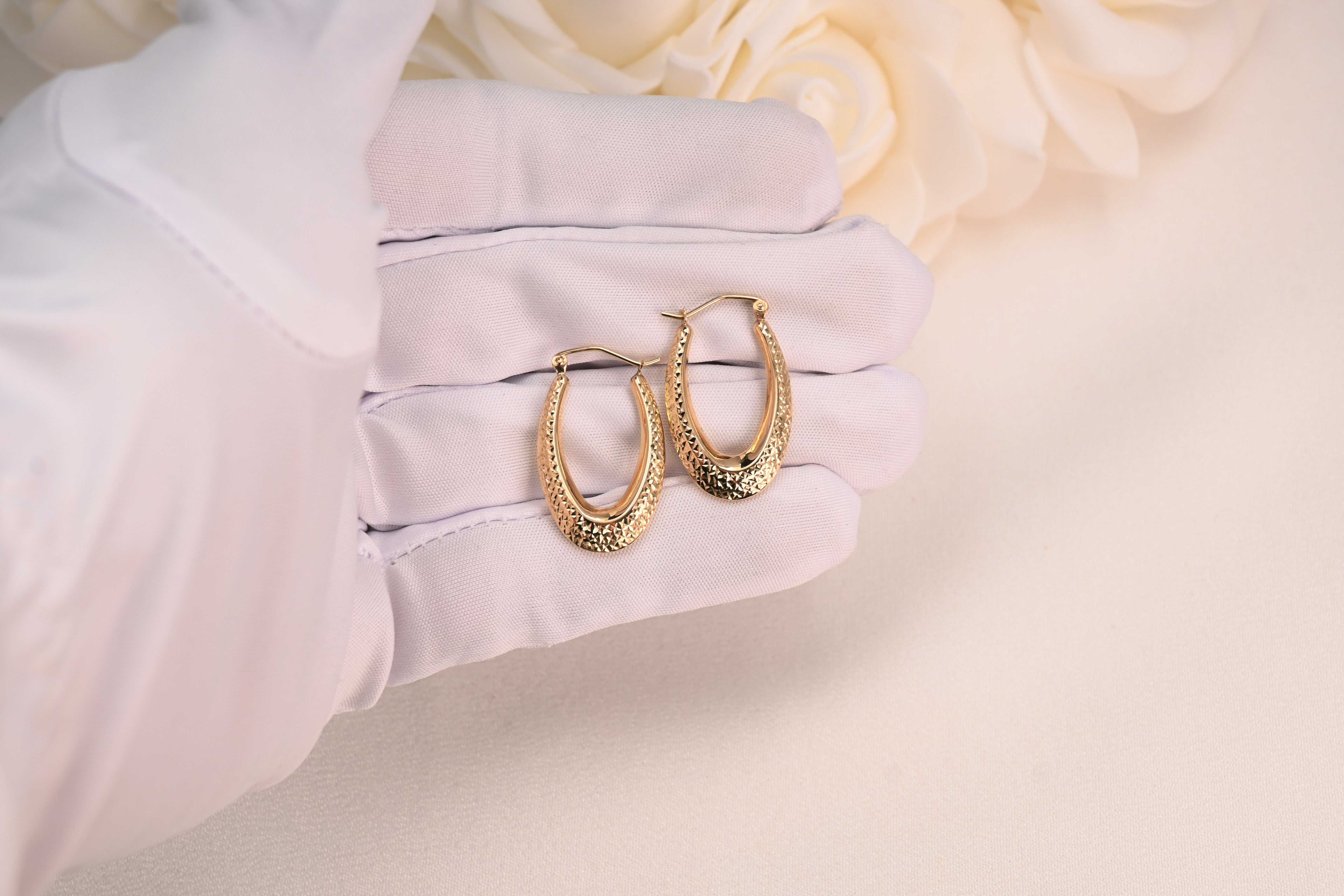 Beautiful 14k Gold Diamond Cut Oval Hoop Earrings