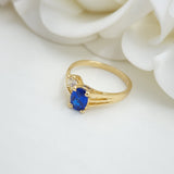 14k Solid Gold Simulated Oval Sapphire Ring - Unique and Elegant.