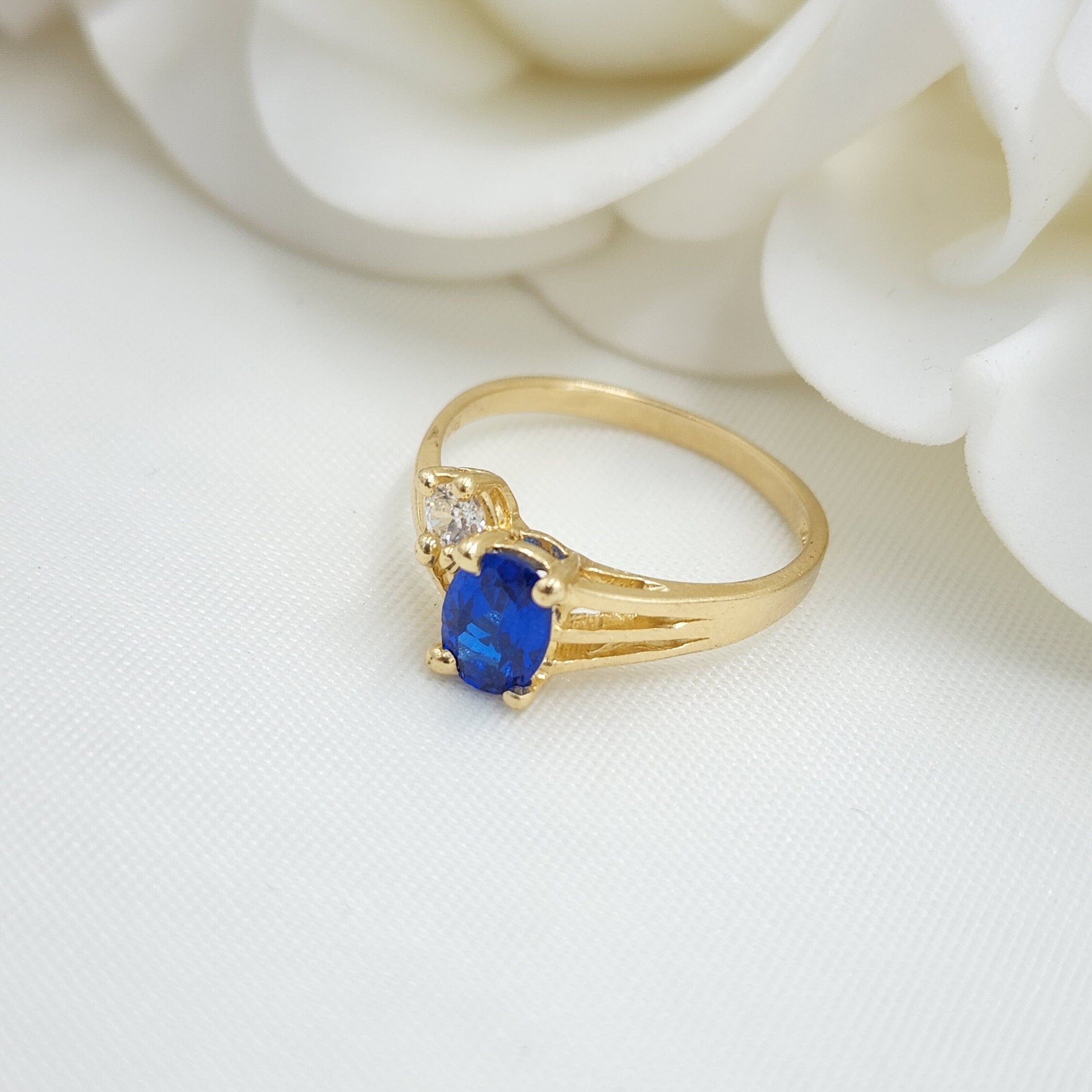 14k Solid Gold Simulated Oval Sapphire Ring - Unique and Elegant.