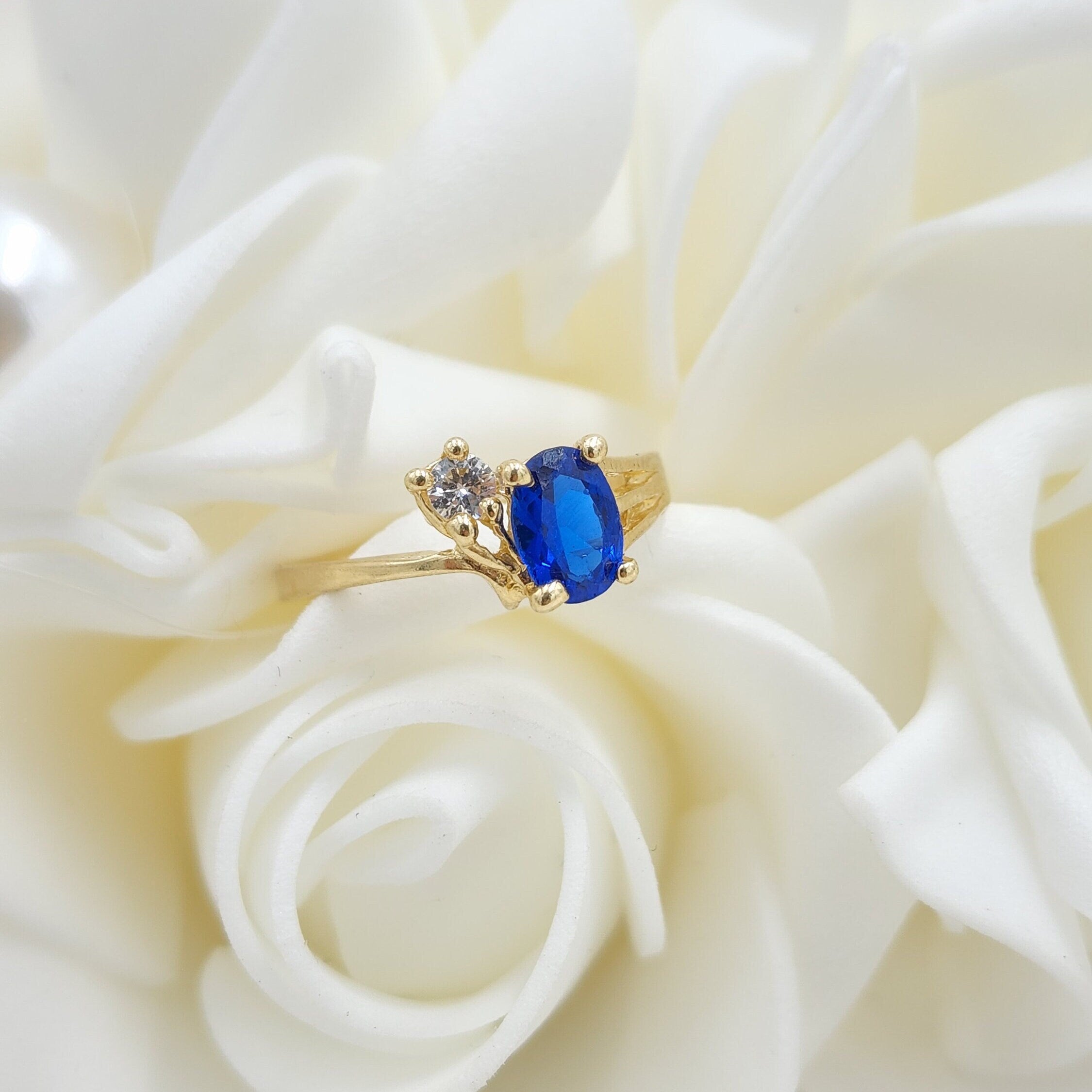 14k Solid Gold Simulated Oval Sapphire Ring - Unique and Elegant.