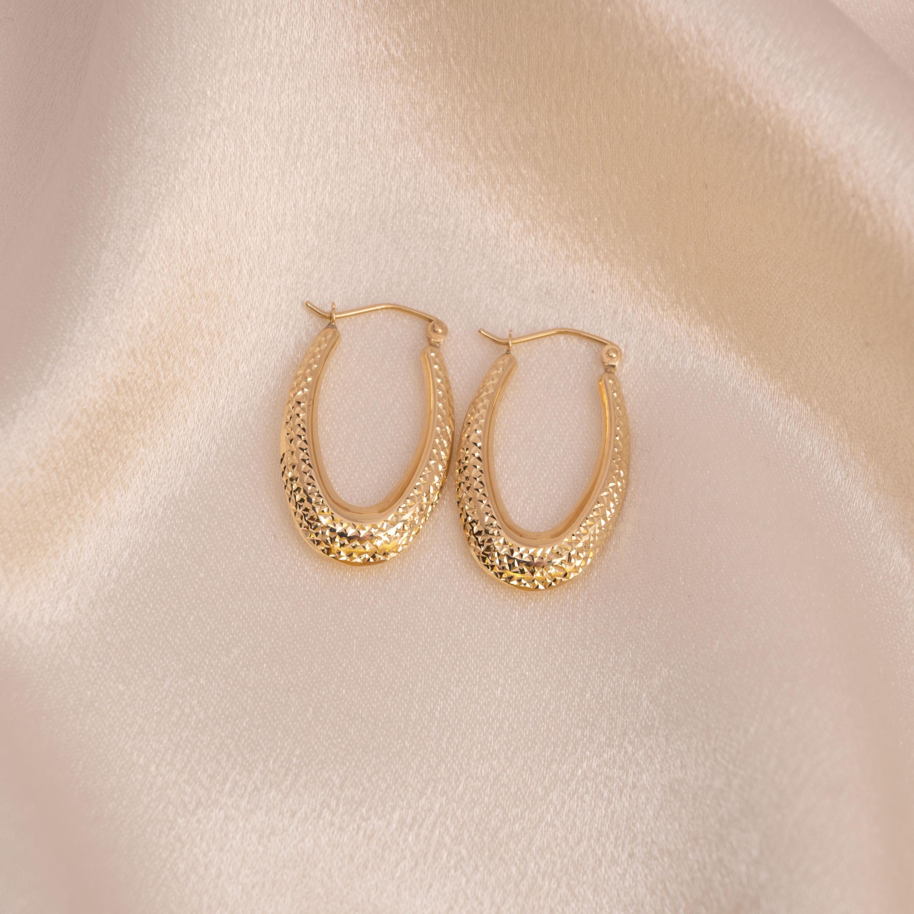 Beautiful 14k Gold Diamond Cut Oval Hoop Earrings
