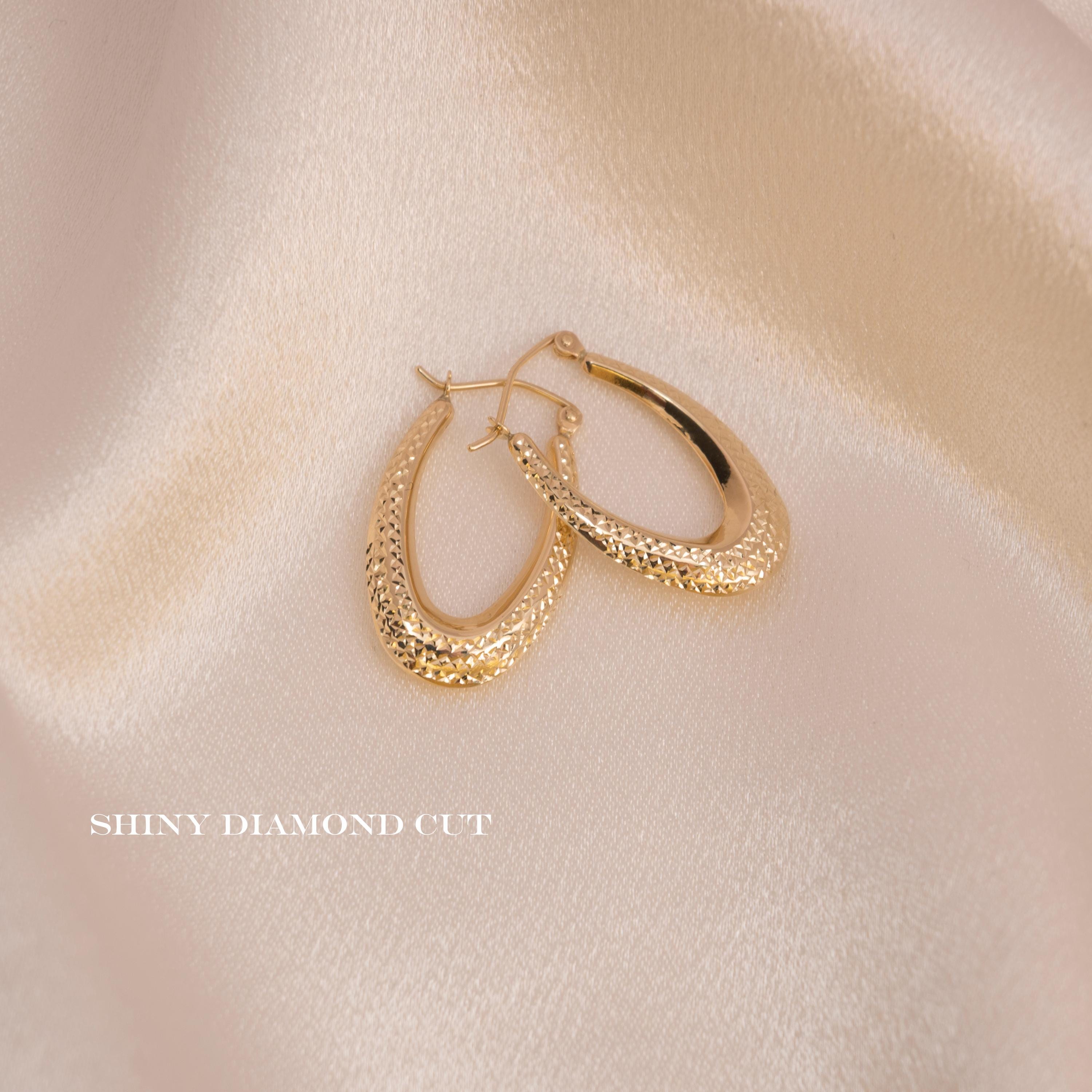 Beautiful 14k Gold Diamond Cut Oval Hoop Earrings